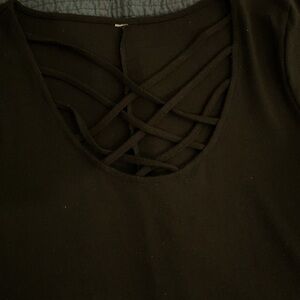 Black swing freed with criss cross neckline